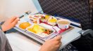 Air-plane-food-on-a-seatback-tray-table-1200×841